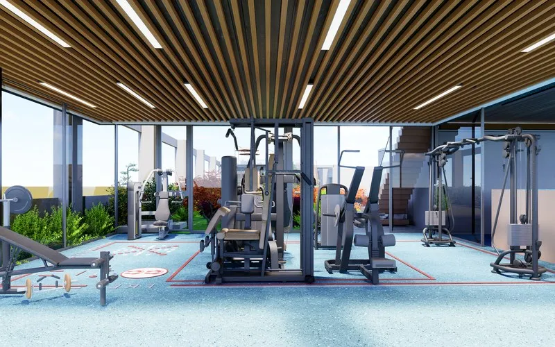 Fitness centre with weight machines and city views
